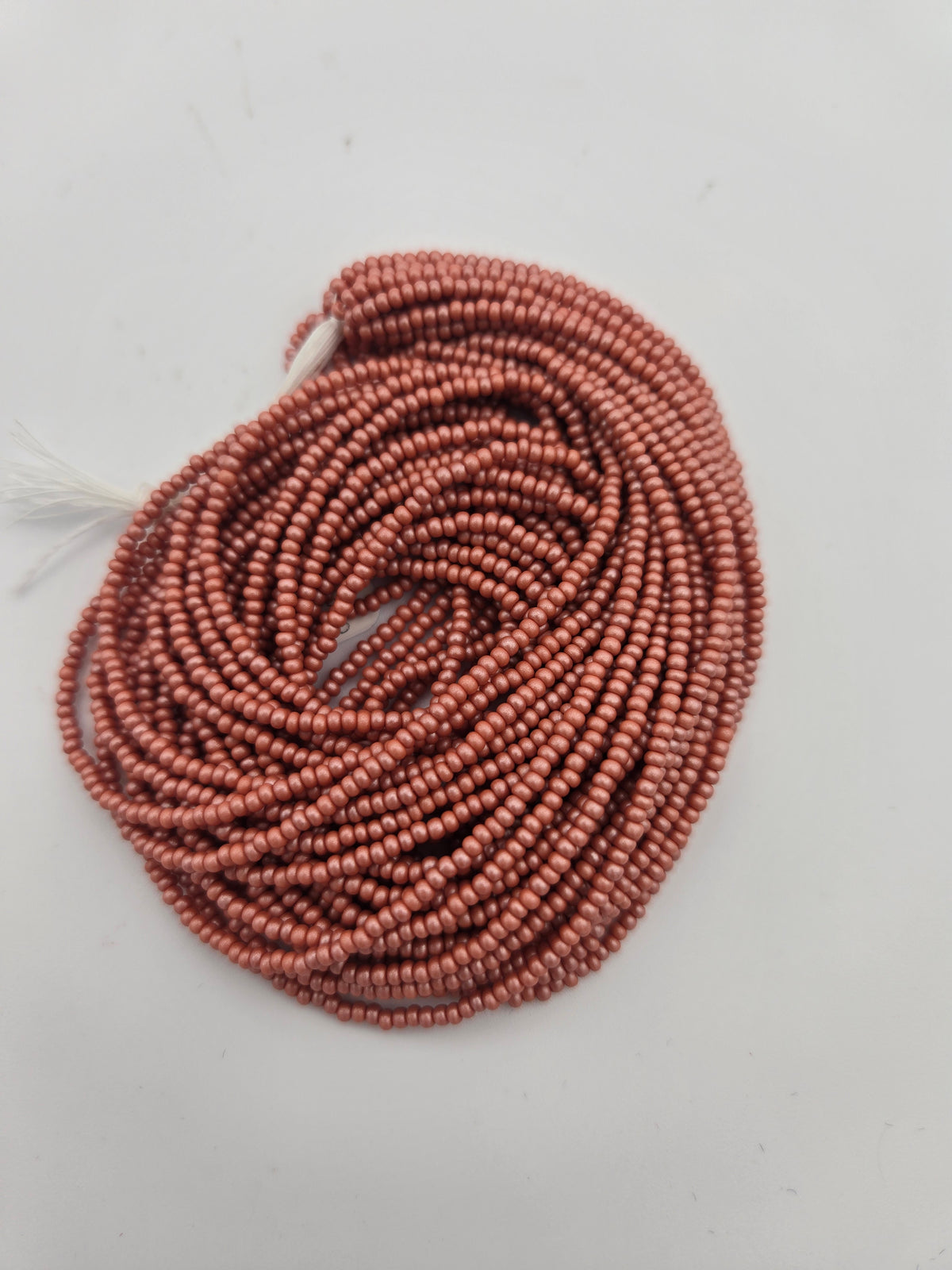 Czech 11/0 PermaLux Dyed Chalk Light Brown Strung