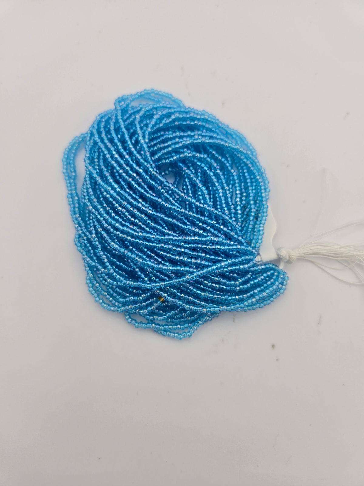 Czech Seed Bead 11/0 Transparent Aqua AB Strung