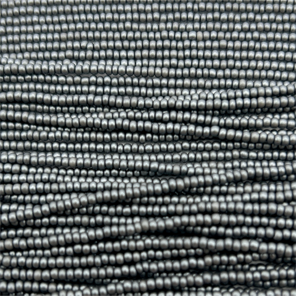 Czech 11/0 PermaLux Dyed Chalk Grey Strung
