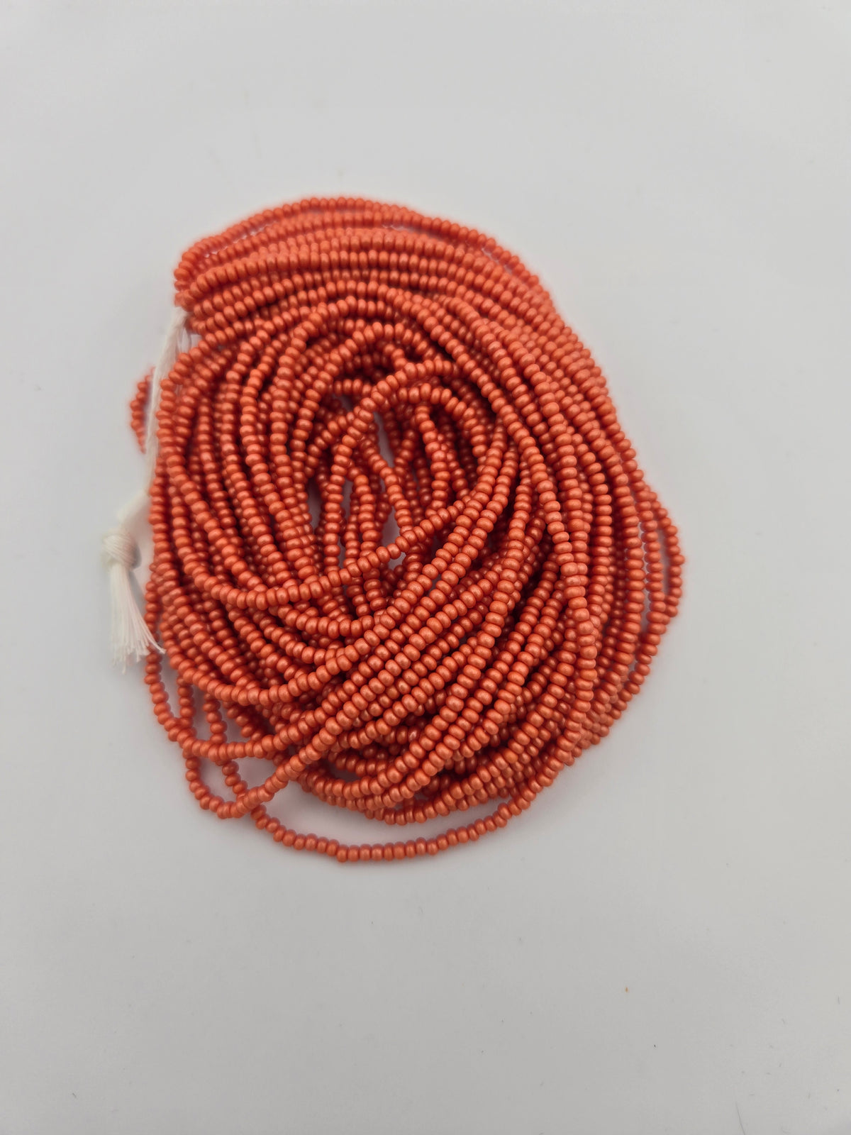 Czech 11/0 PermaLux Dyed Chalk Orange Strung