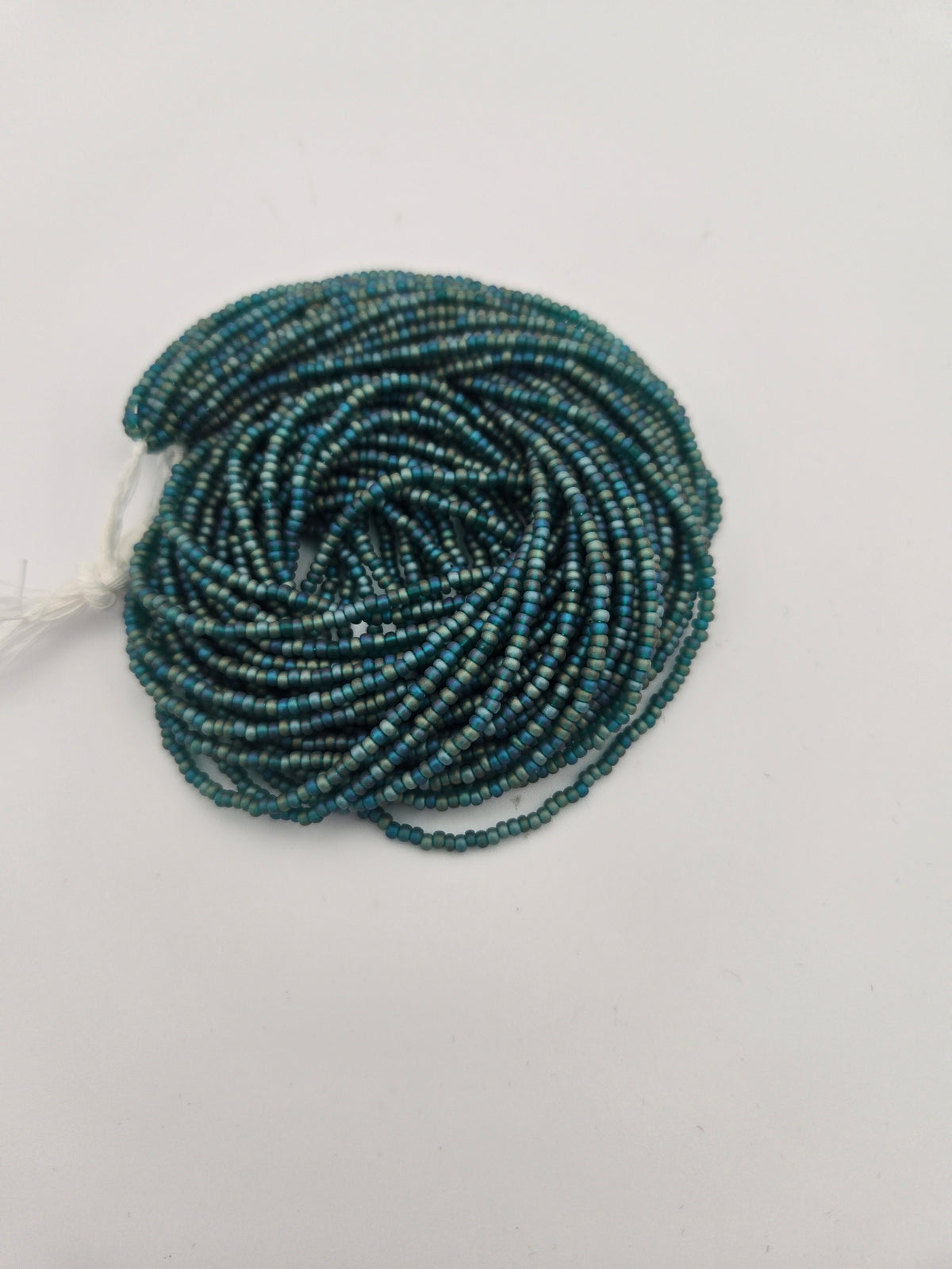Czech Seed Bead 11/0 Tr Teal Green Matt AB Strung