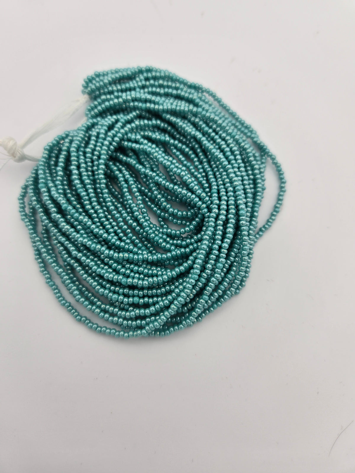 Czech Seed Bead 11/0 Op Turquoise luster Strung