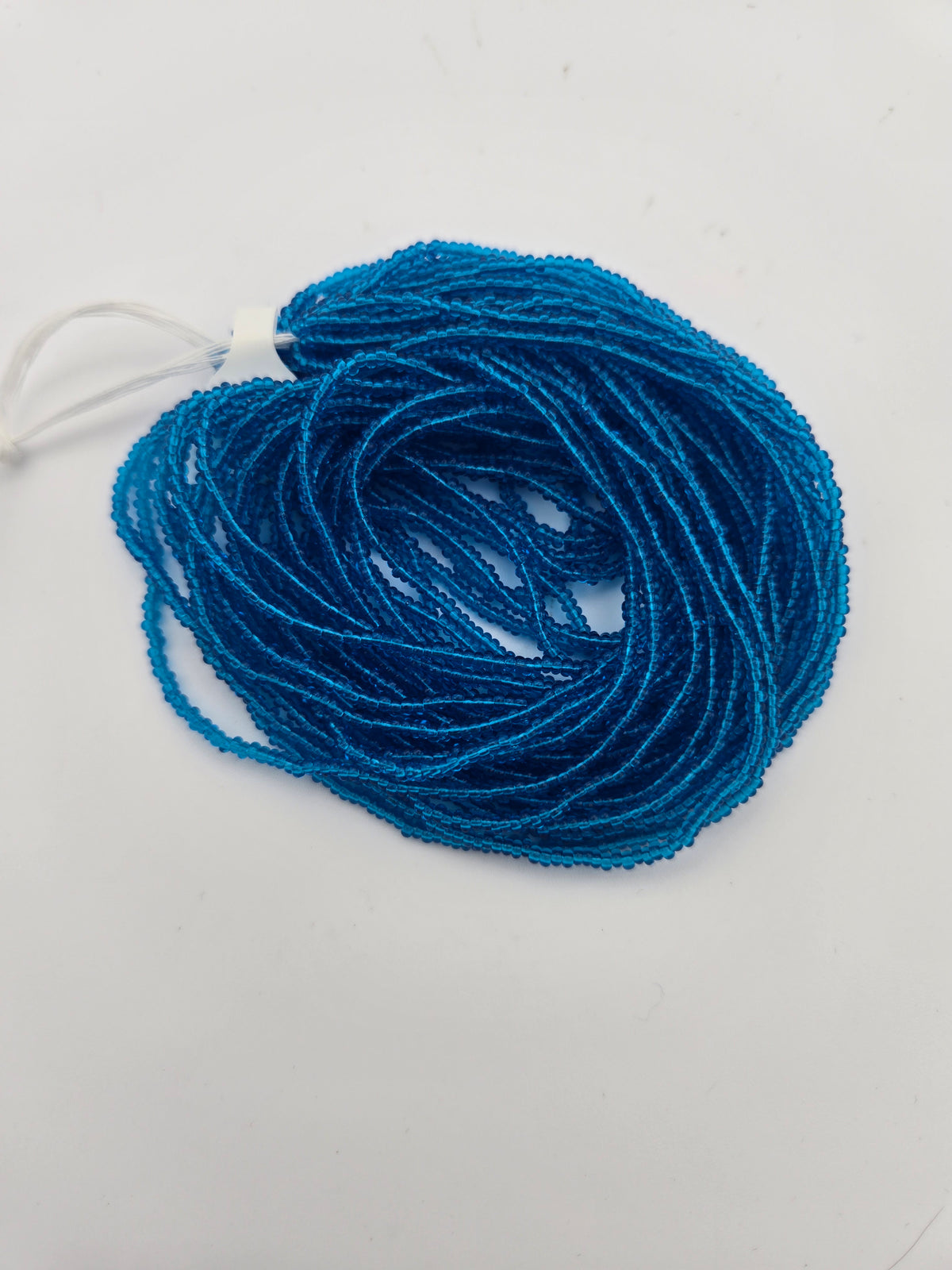 Czech Seed Bead 11/0 Transparent Medium Aqua Strung