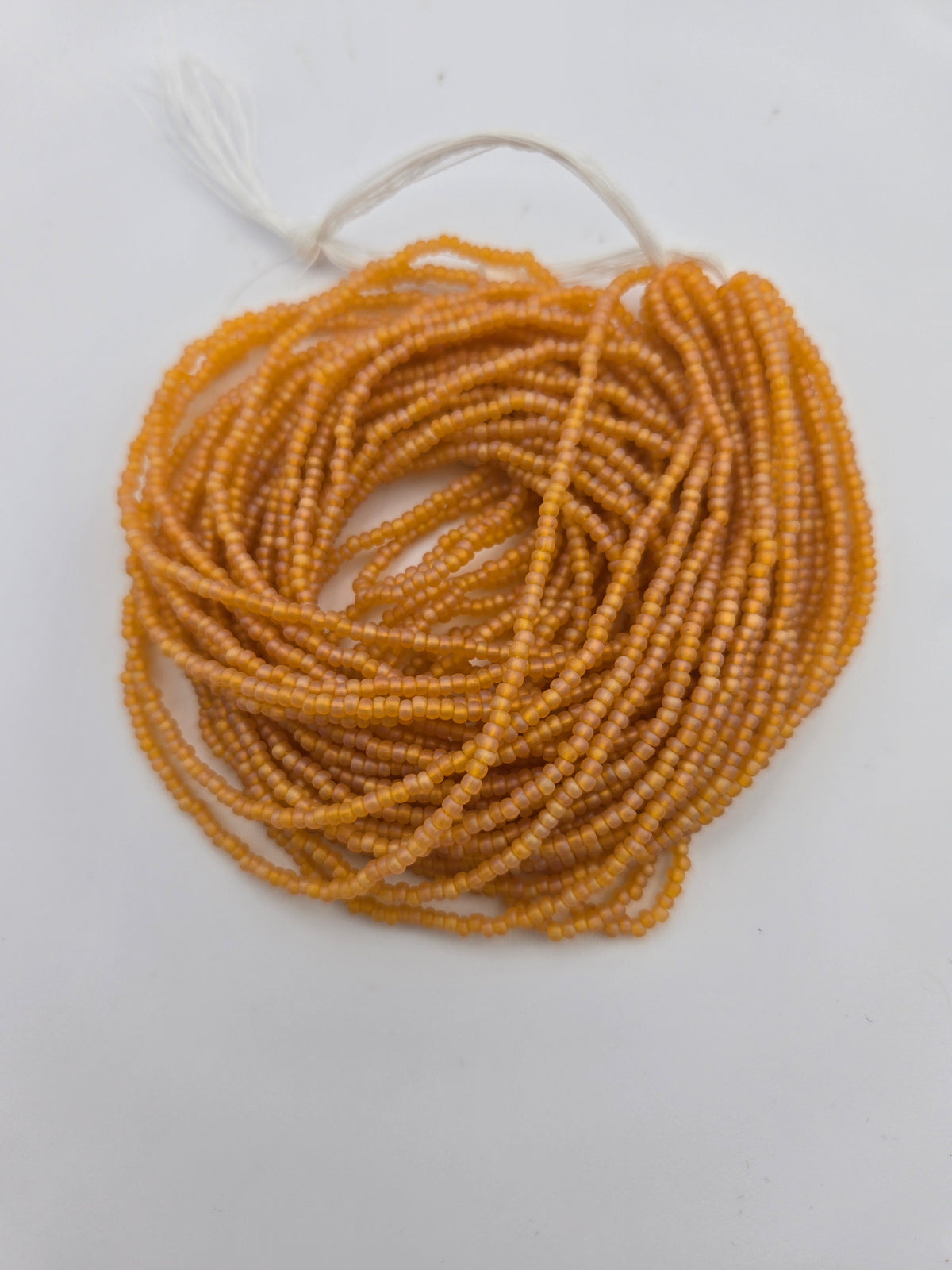 Czech 11/0 Tr Light Orange Matte AB