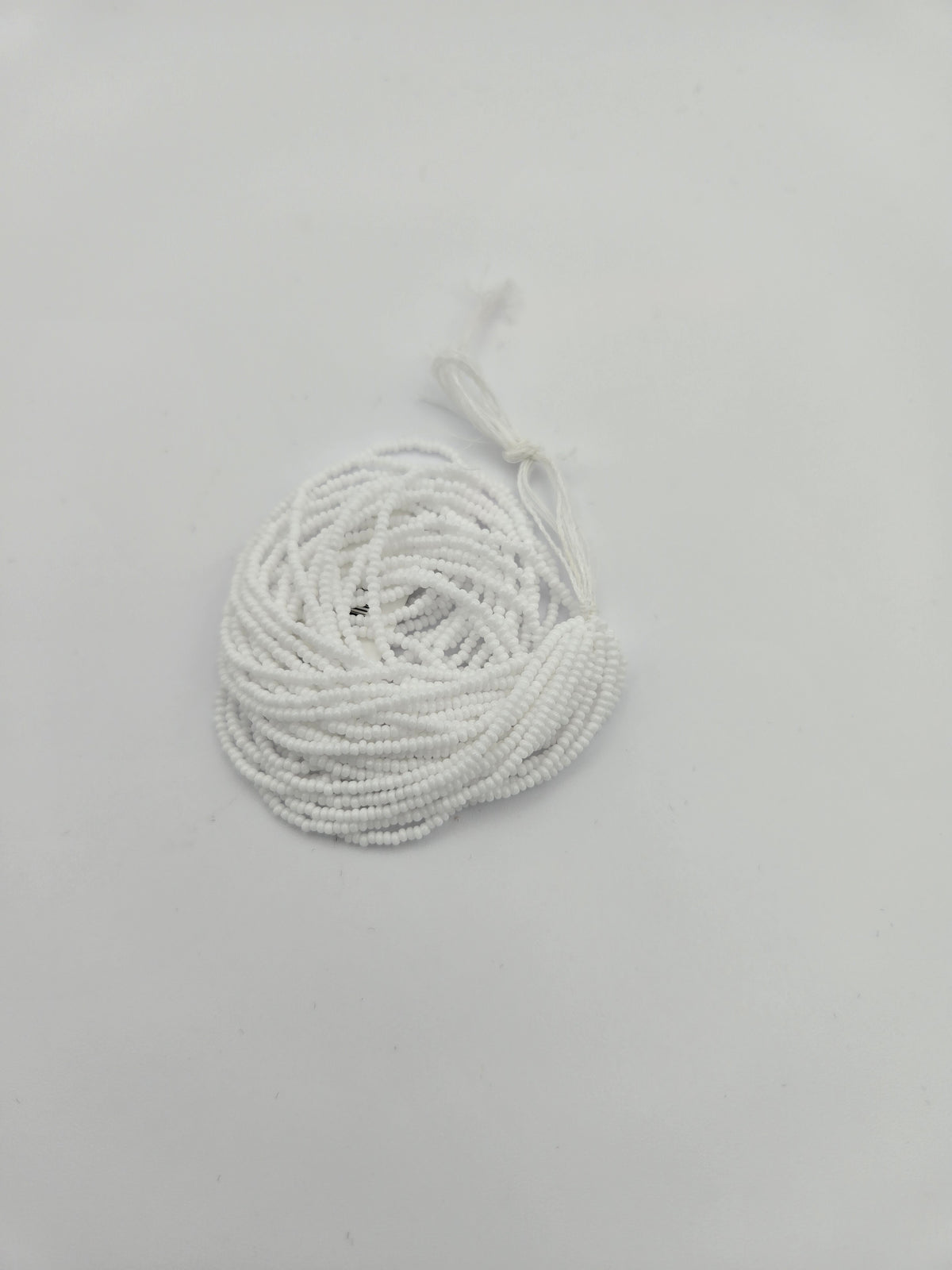 Czech 13/0 Op Chalk White Charlotte Cut