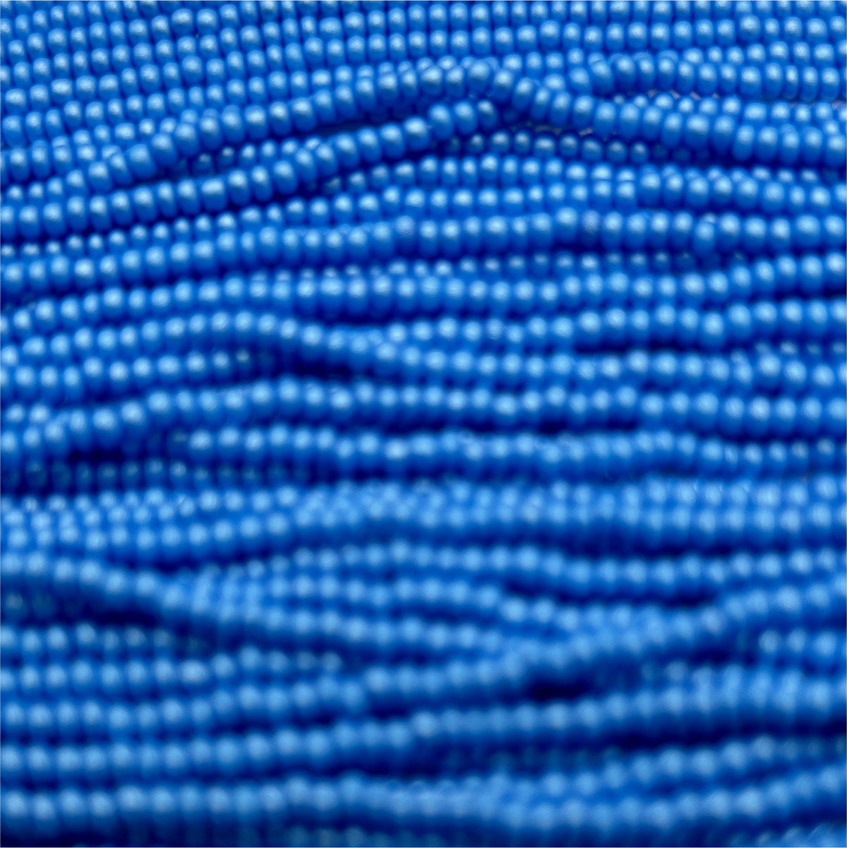 Czech 11/0 PermaLux Dyed Chalk Light Blue Strung