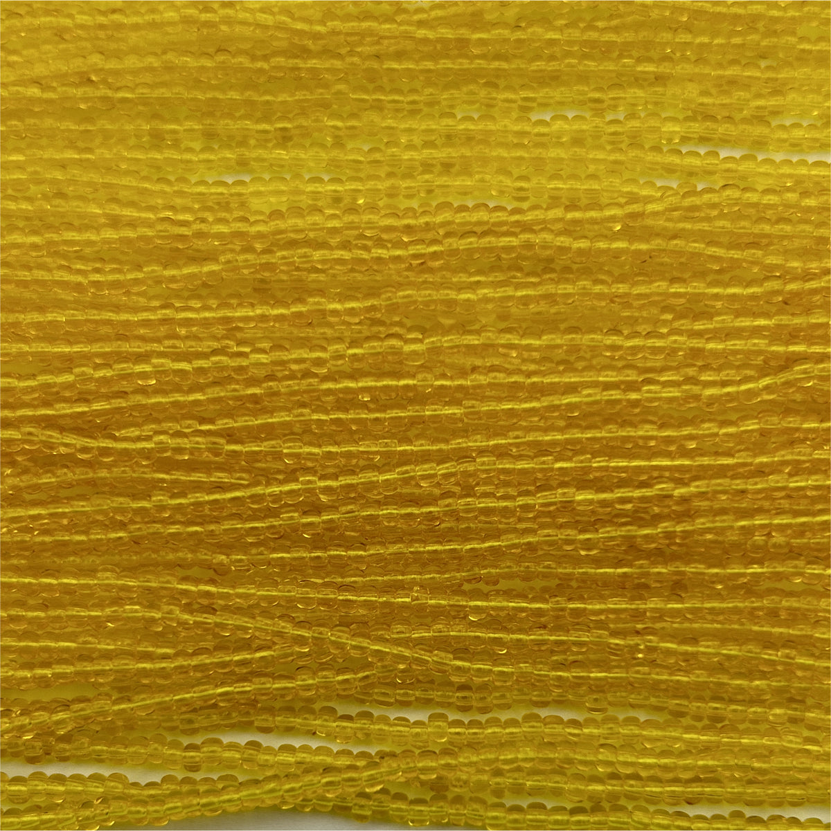 Czech Seed Bead 11/0Transparent Yellow Strung