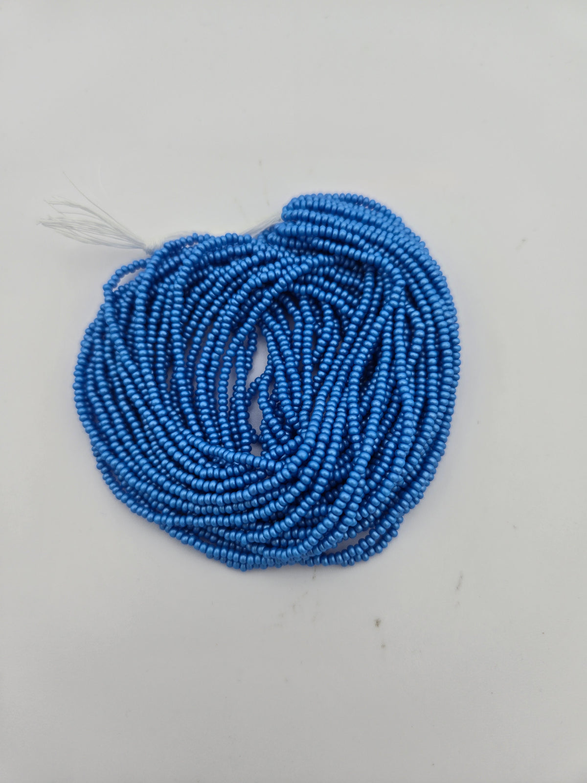 Czech 11/0 PermaLux Dyed Chalk Light Blue Strung