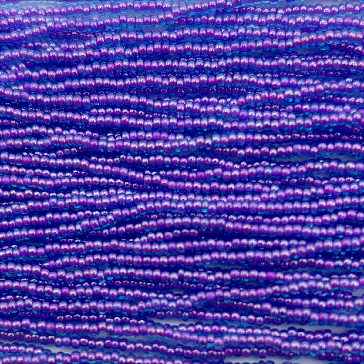 Czech Seed Bead 11/0 Transparent Aqua/Amethyst lined