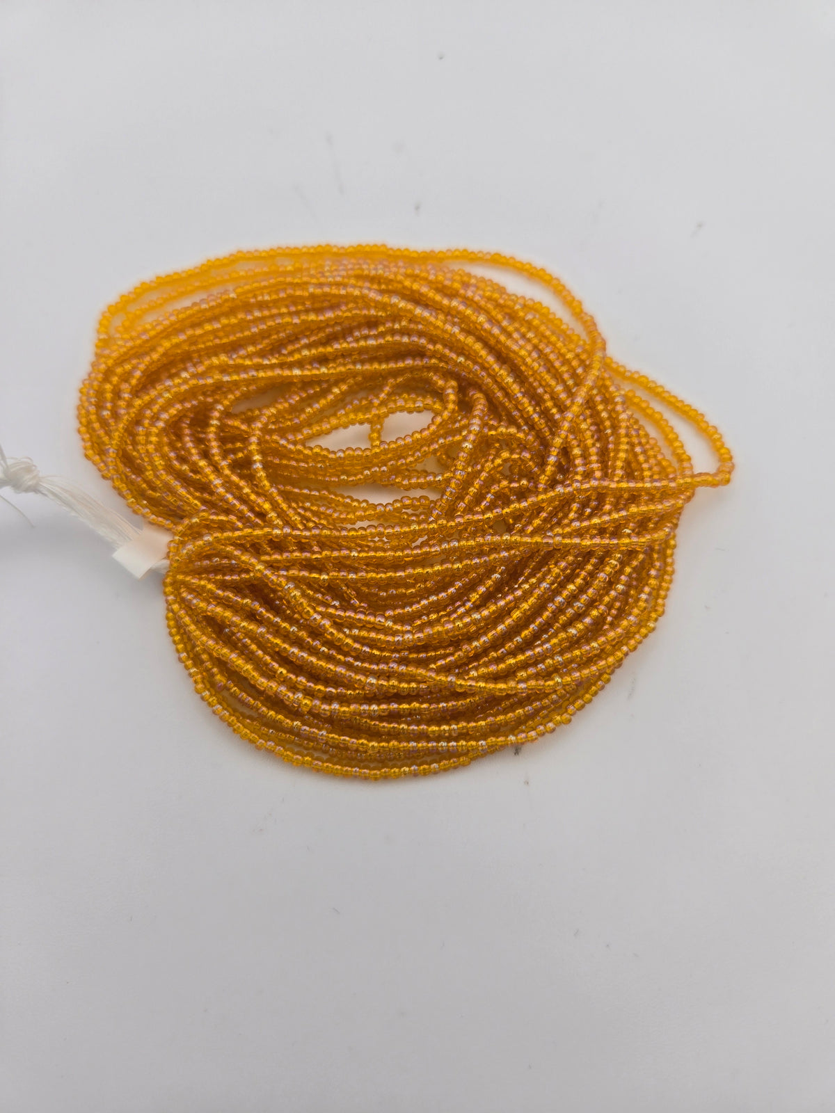Czech 11/0 Tr Lt Orange AB Strung