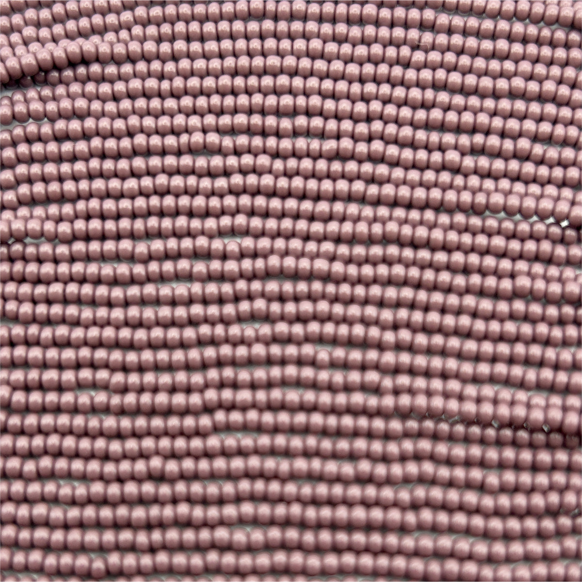 Czech Seed Bead 11/0 Op Dark Mauve Strung