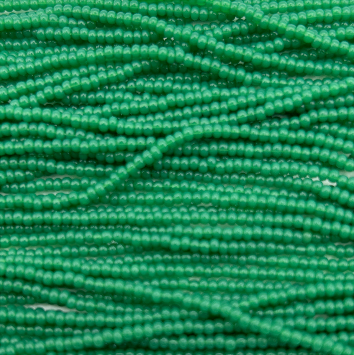 Czech 11/0 Op Oily Green Strung