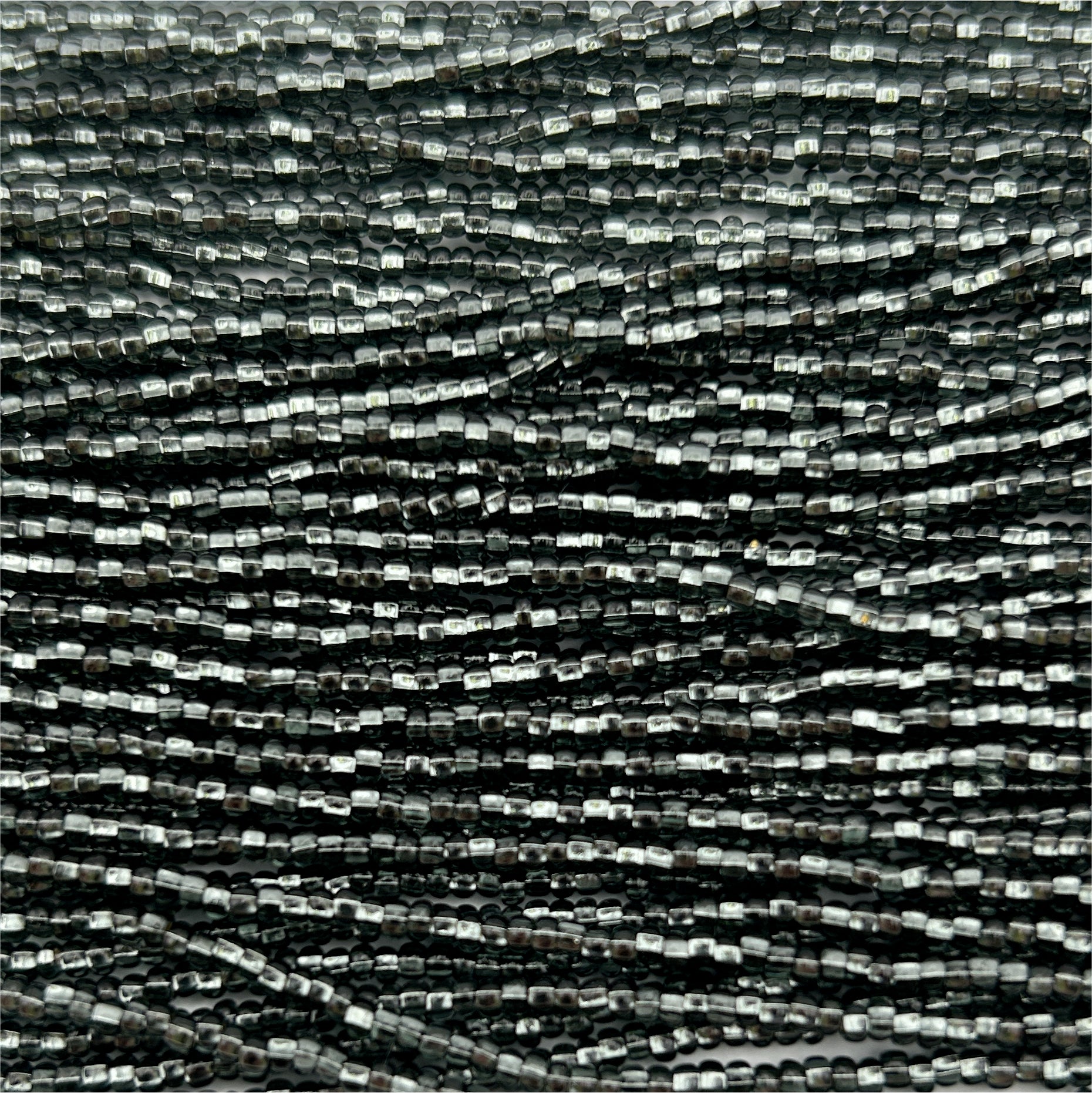 Czech Seed Bead 11/0 S/L Natural Grey Strung