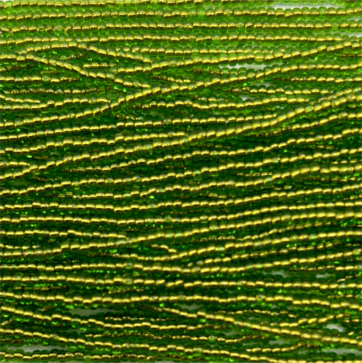 Czech 11/0 Transparent Green/Copper Lined Strung