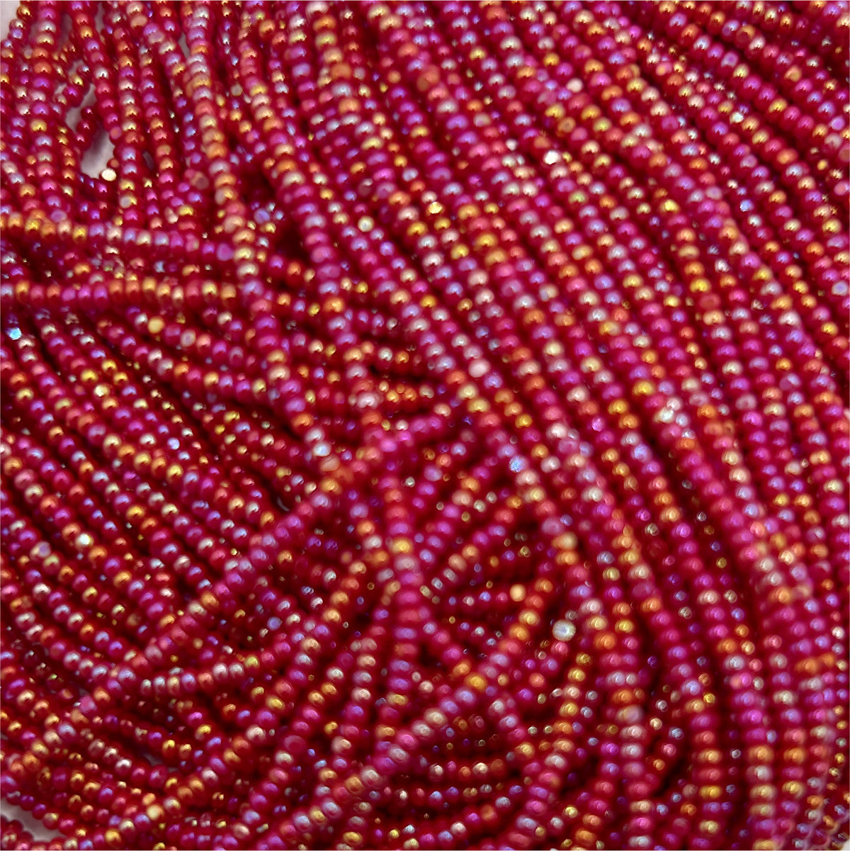 Czech 13/0 Op Dark Red Iris Charlotte Cut