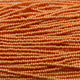 Czech 11/0 PermaLux Dyed Chalk Apricot Strung