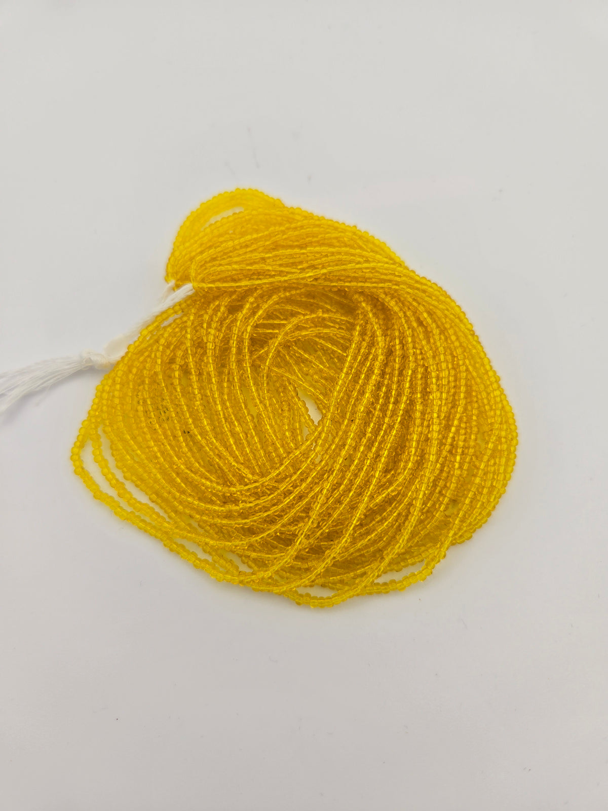 Czech Seed Bead 11/0Transparent Yellow Strung