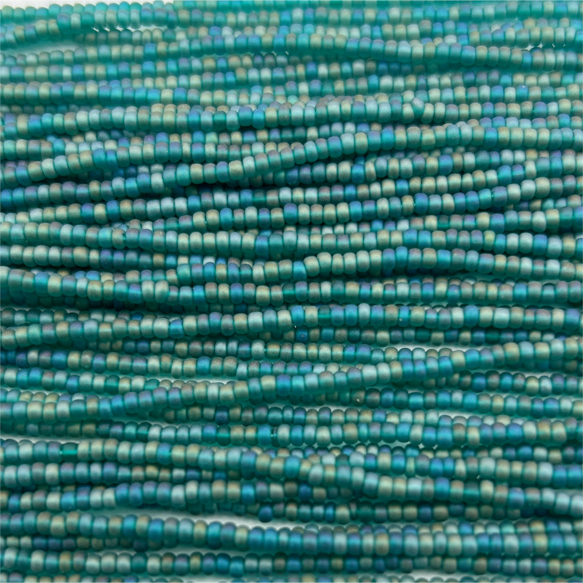 Czech Seed Bead 11/0 Transparent Teal Green AB Strung