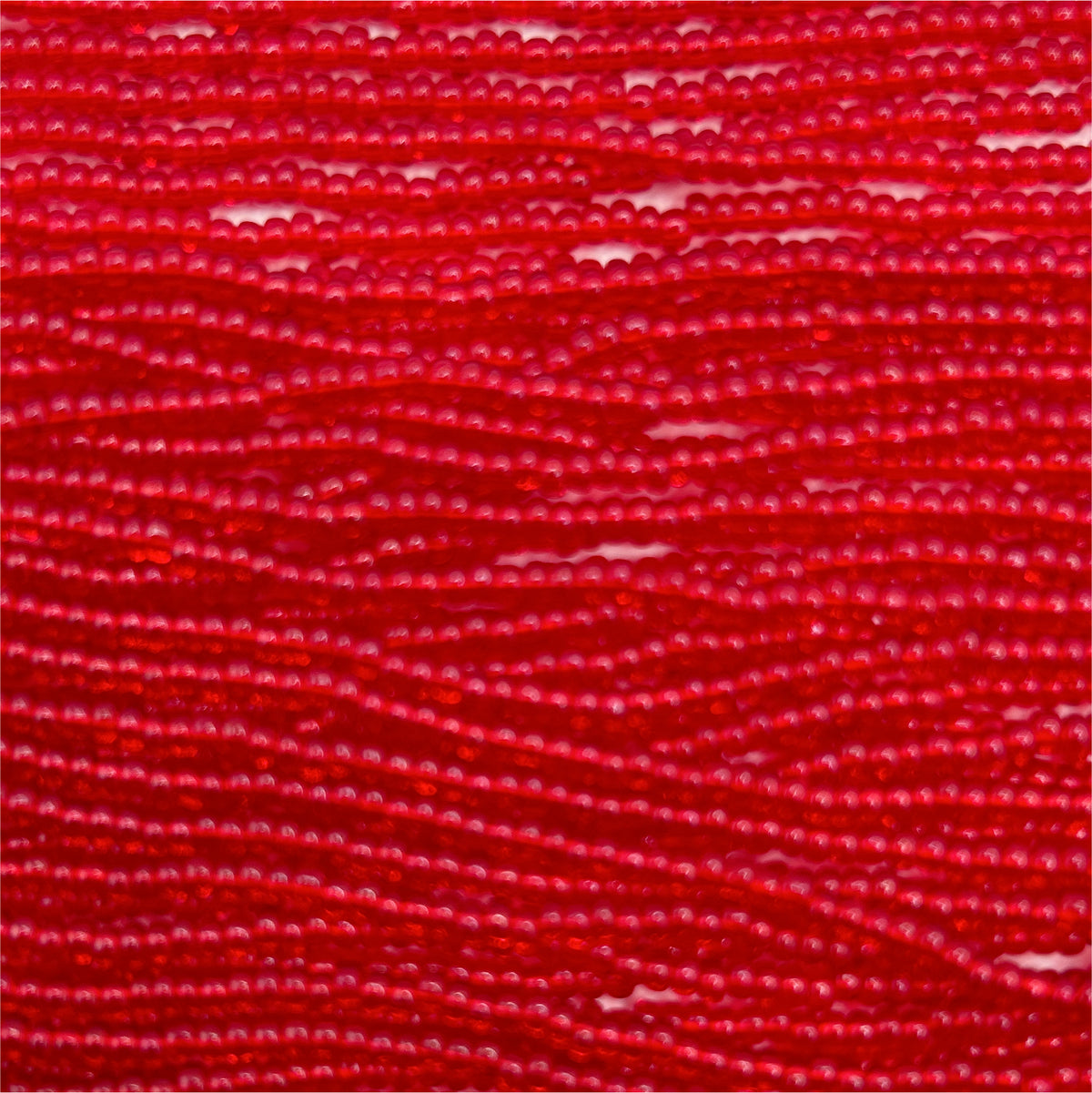 Czech Seed Bead 11/0 Transparent Red Strung