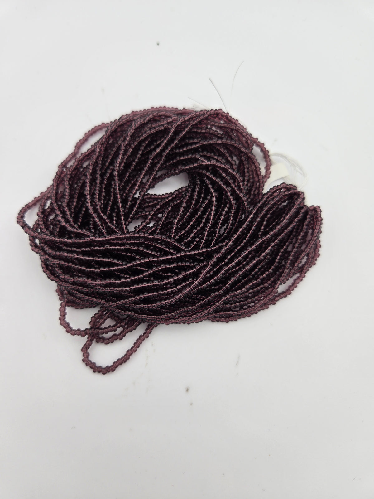 Czech Seed Bead 11/0 Transparent Amethyst Strung