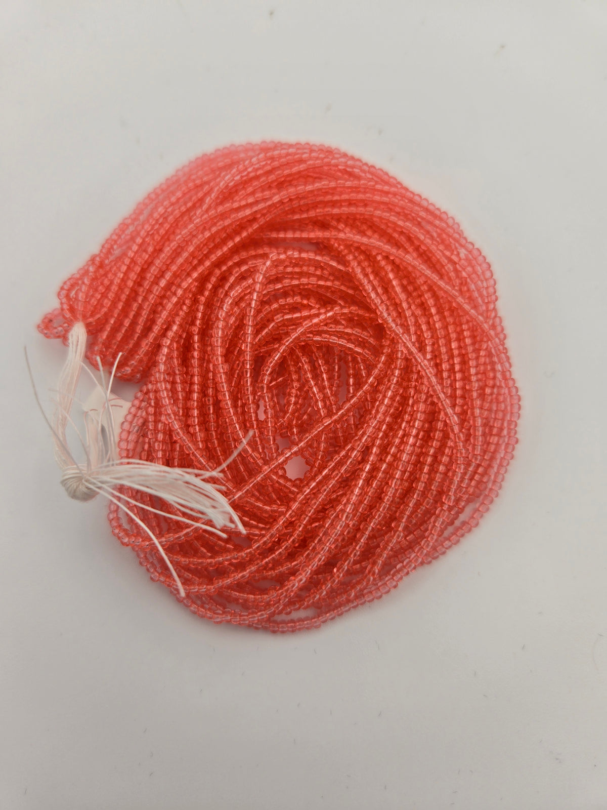 Czech 11/0 Transparent Dark Rose Solgel Strung