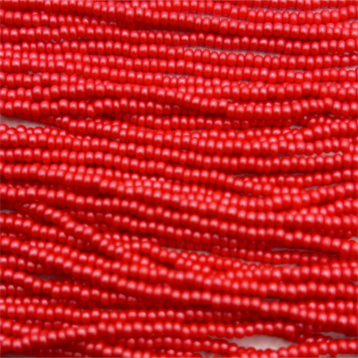 Czech 11/0 PermaLux Dyed Chalk Red Strung