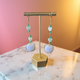 Green Puff Danglers by Christina Williams