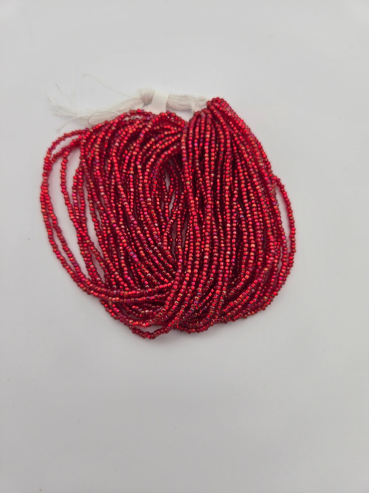 Czech Seed Bead 11/0 S/L Red Rainbow Strung