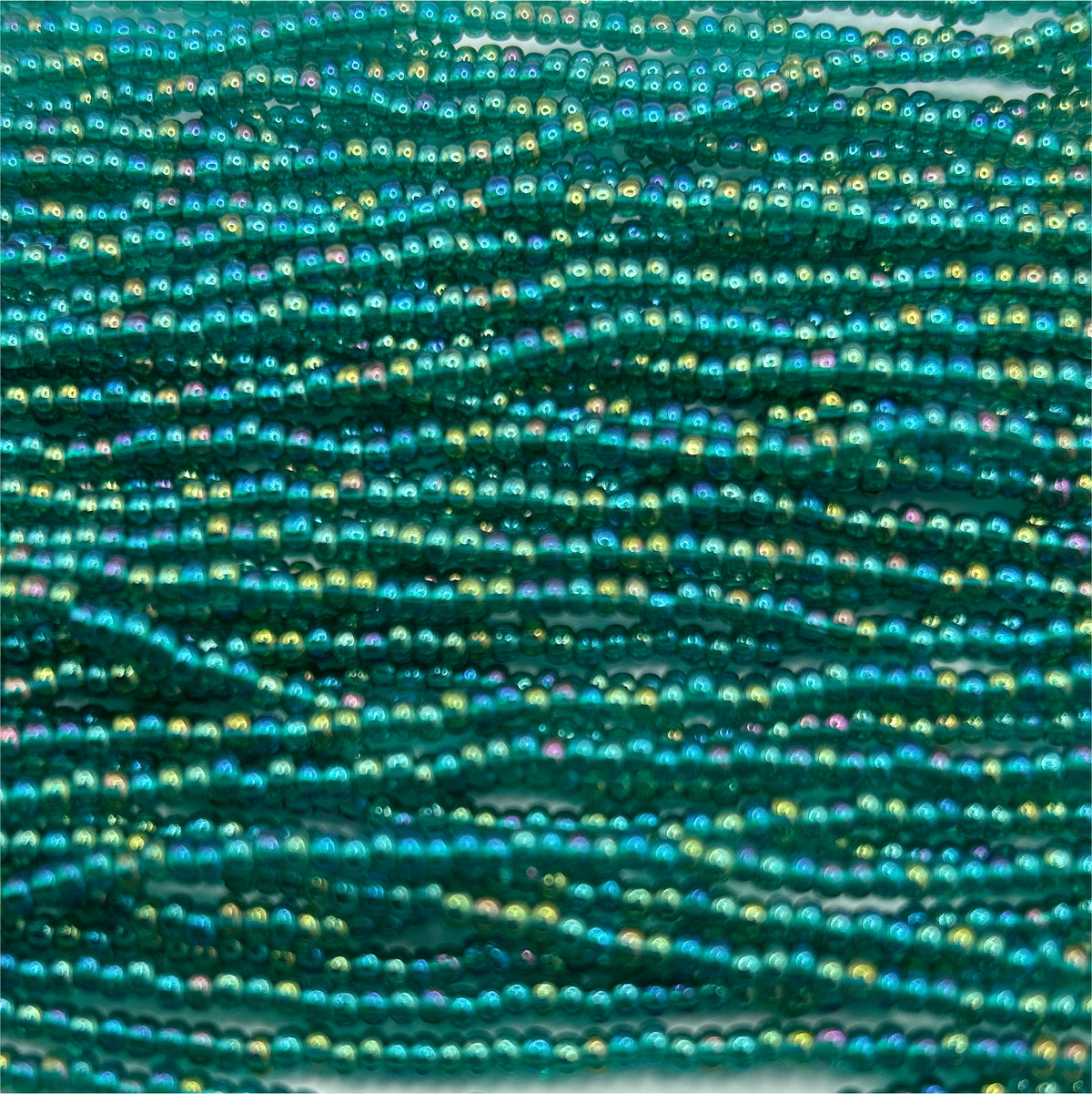 Czech Seed Bead 11/0 Transparent Teal Green AB Strung