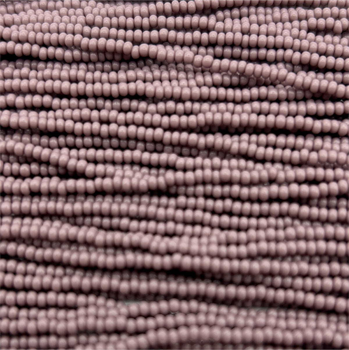 Czech Seed Bead 11/0 Op Mauve Strung
