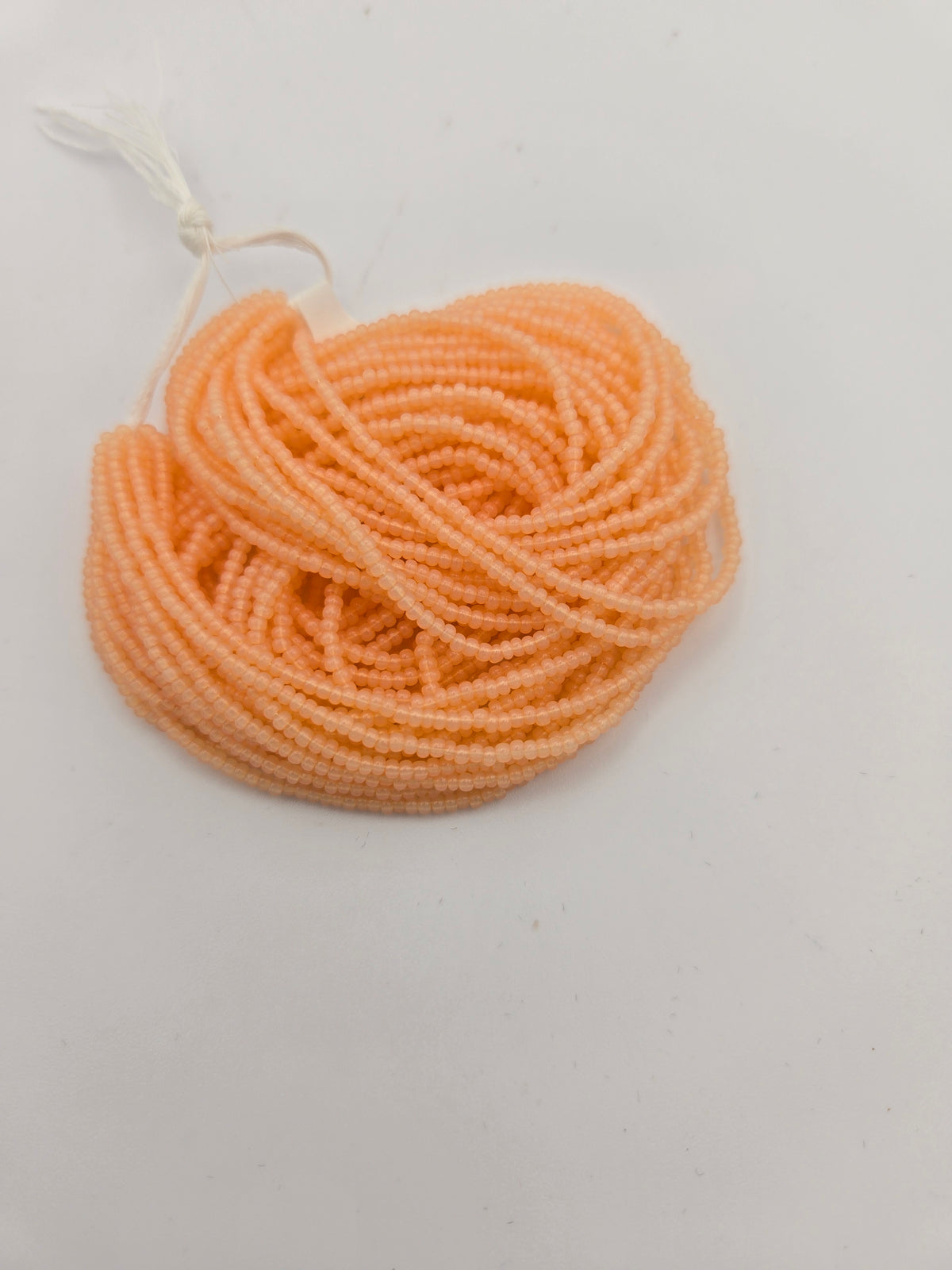 Czech 11/0 Pearl Peach Solgel Strung