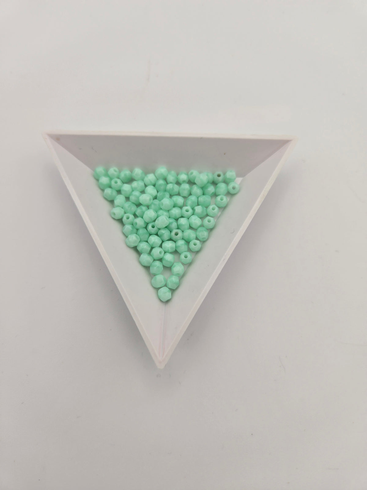 F/P 4mm Op. Lt. Green Silk Faceted Round (100 pc)