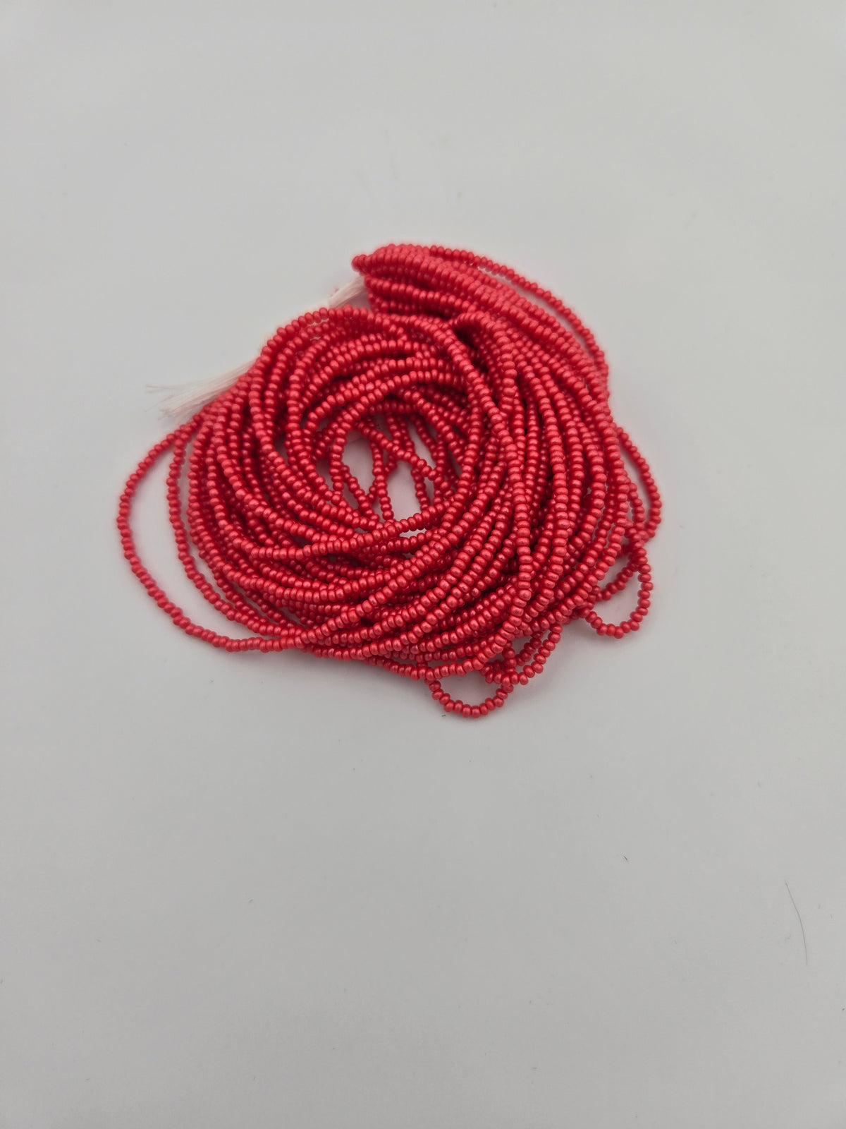 Czech 11/0 PermaLux Dyed Chalk Red Strung