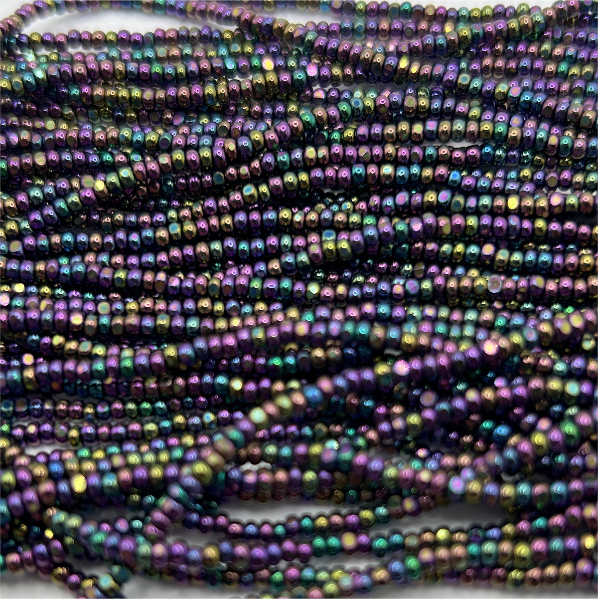 Cz 11/0 Cut Purple Iris Metallic