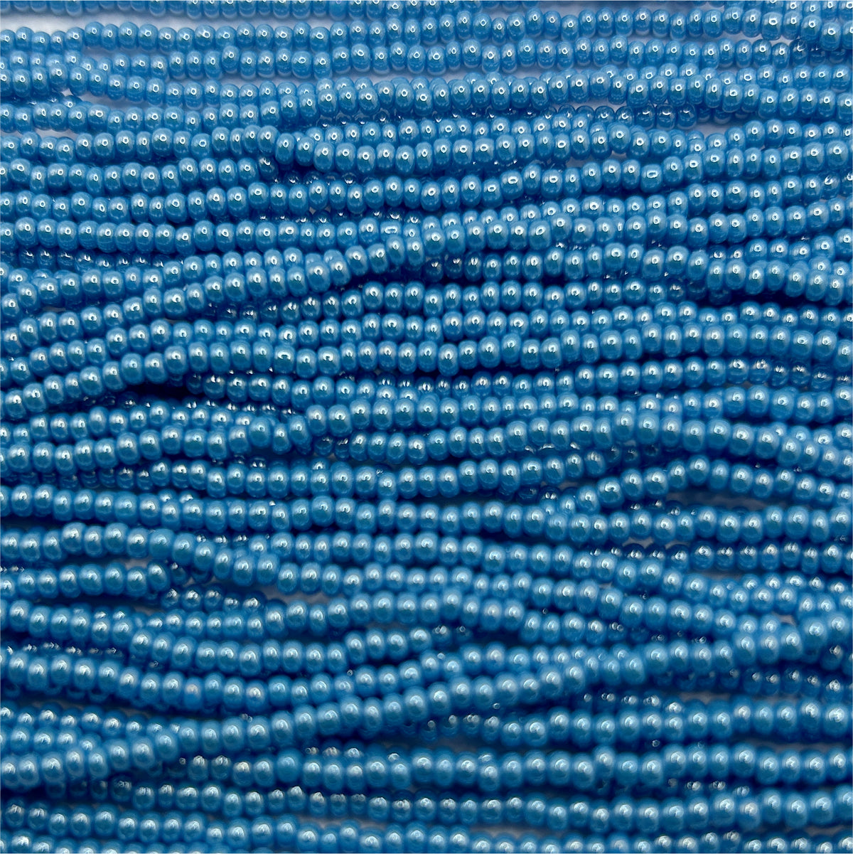 Czech Seed Bead 11/0 Op Blue Luster Strung