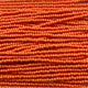 Czech 11/0 PermaLux Dyed Chalk Orange Strung