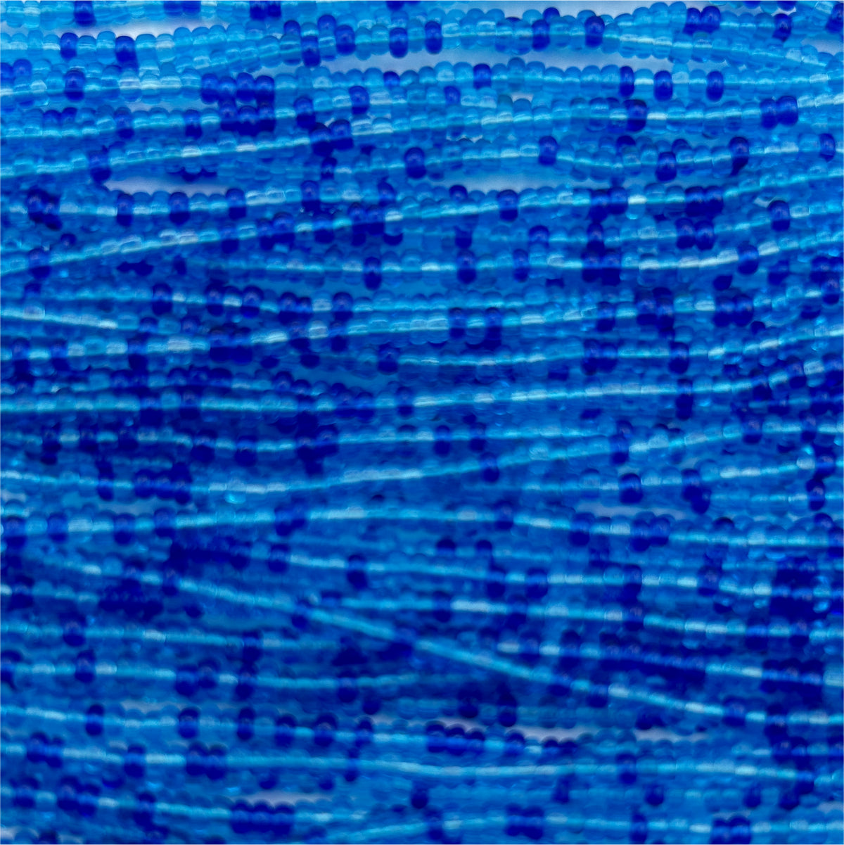 Czech Seed Bead 11/0 Transparent Aqua Mix Strung