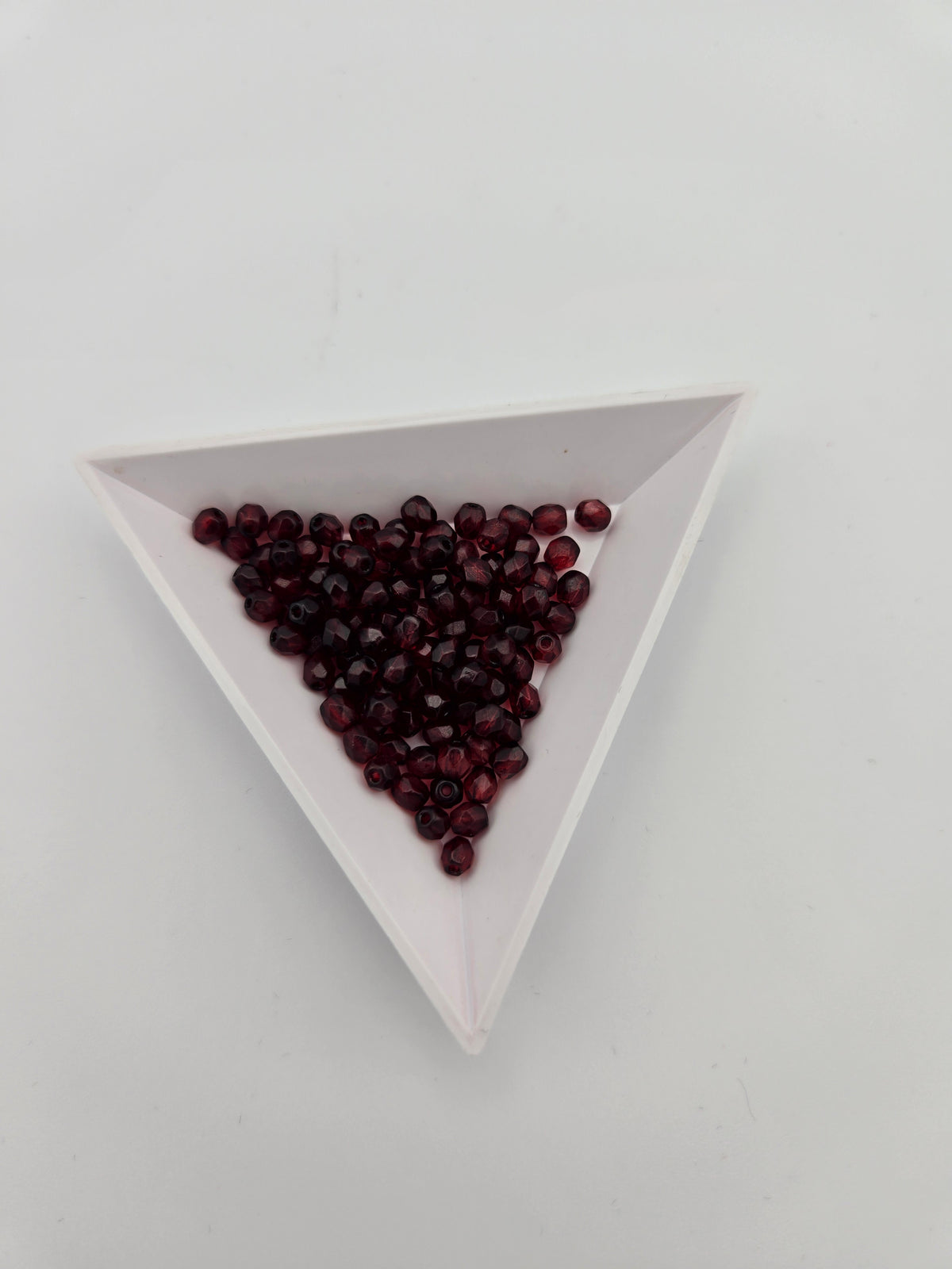 Fire-Polished Glass, Tr. Dark Red, 4mm Faceted Round, Approx. 100 per bag.