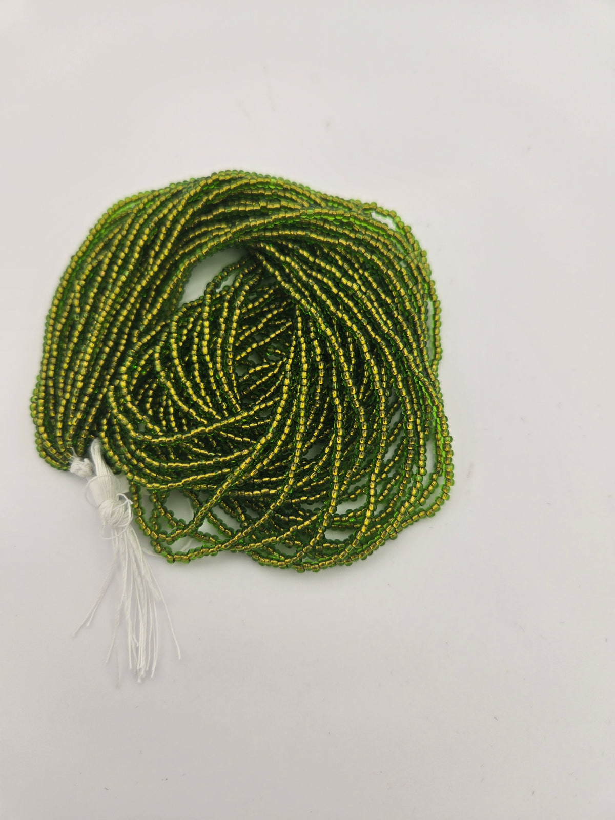 Czech 11/0 Transparent Green/Copper Lined Strung