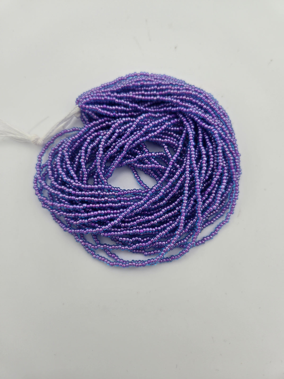 Czech Seed Bead 11/0 Transparent Aqua/Amethyst lined