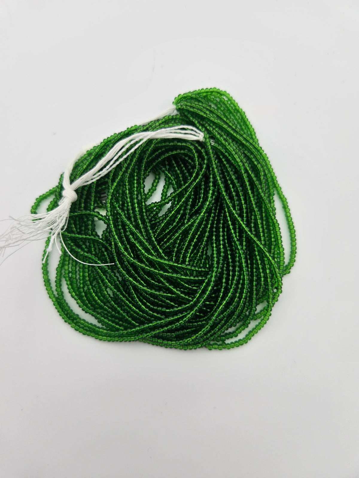Czech Seed Bead 11/0 Transparent Medium Green Strung