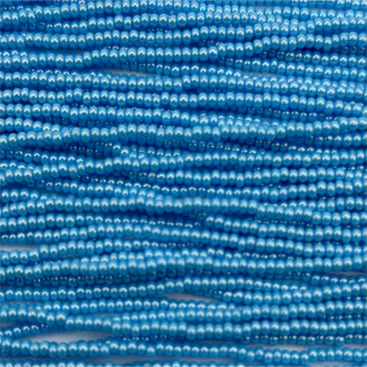 Czech 11/0 Op Lt Blue Luster Strung