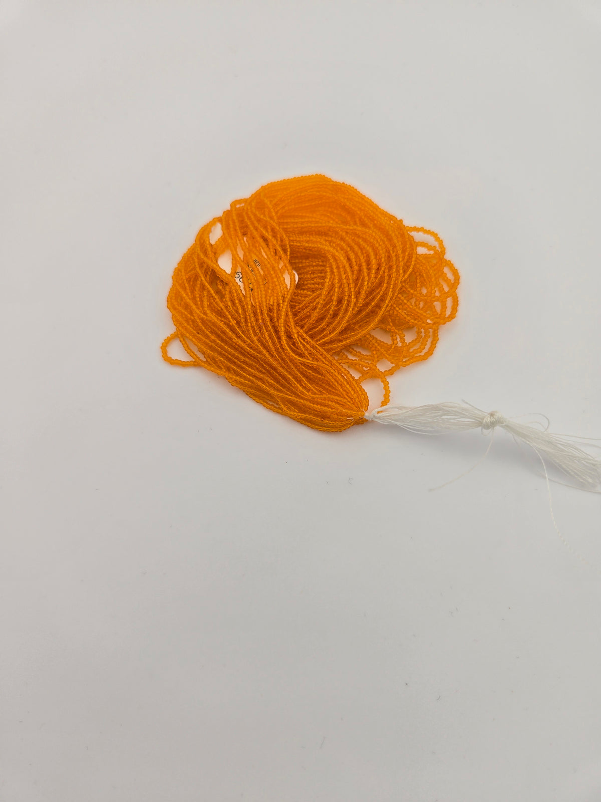 Czech 15/0 Tr Orange Seed Bead