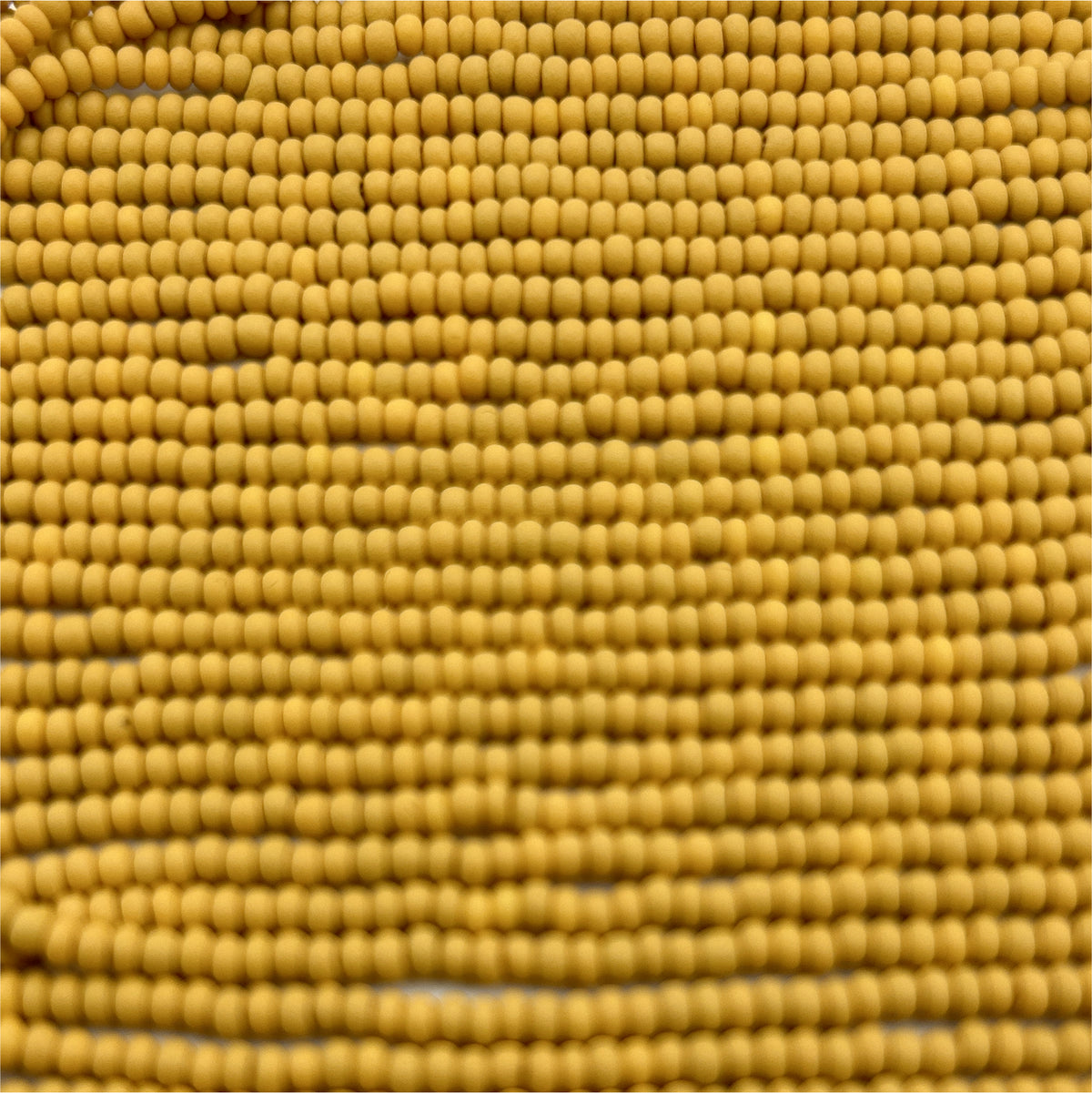 Czech 11/0 PermaLux Dyed Chalk Yellow-Brown