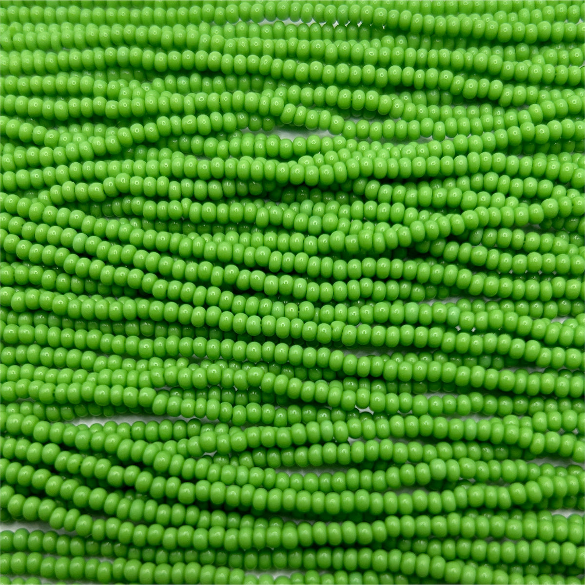 Czech 11/0 Op Light Green Strung