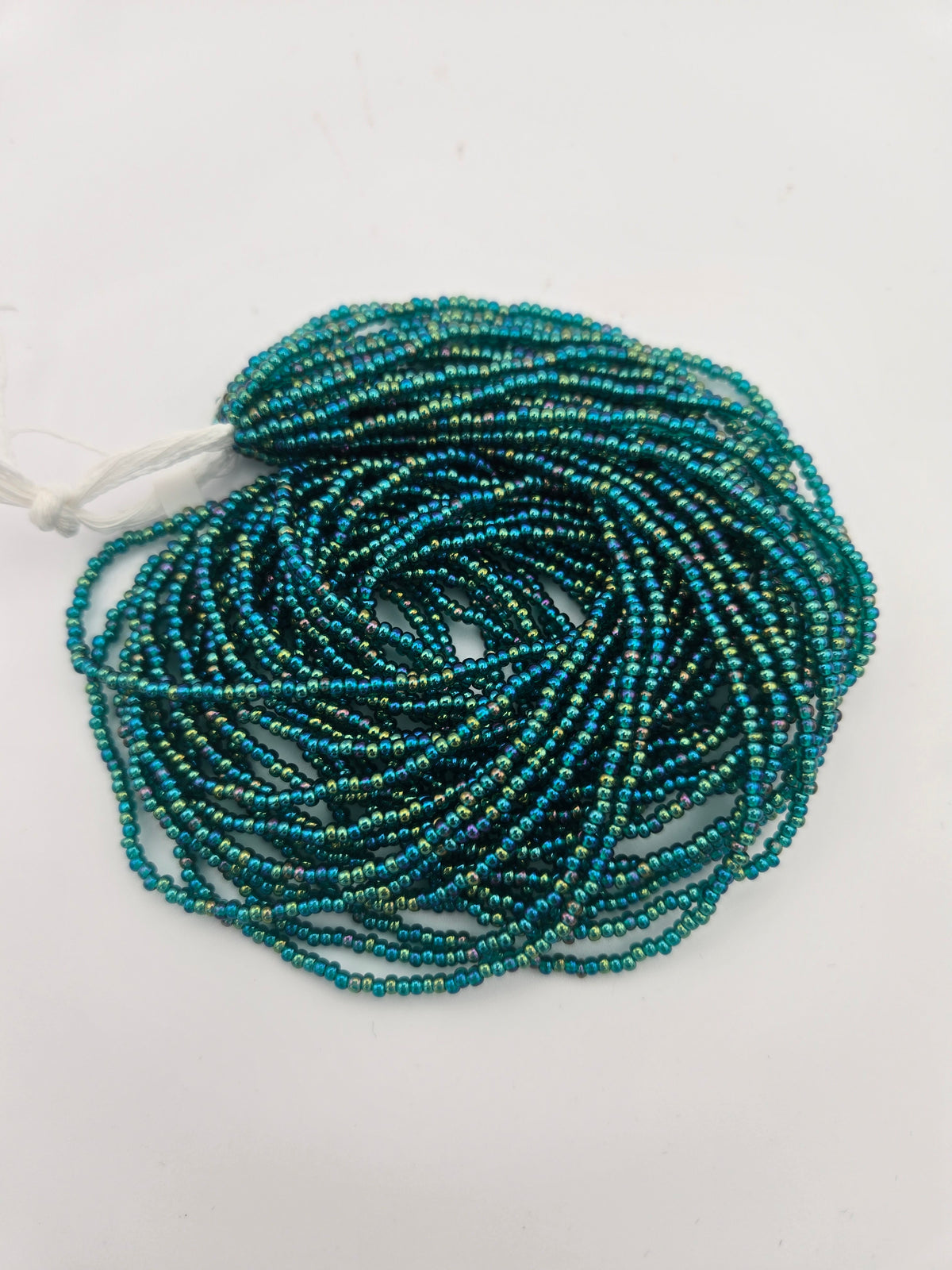 Czech Seed Bead 11/0 Transparent Teal Green AB Strung