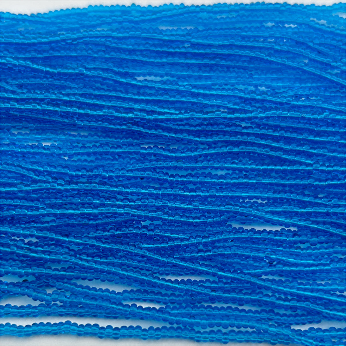 Czech Seed Bead 11/0 Transparent Medium Aqua Strung