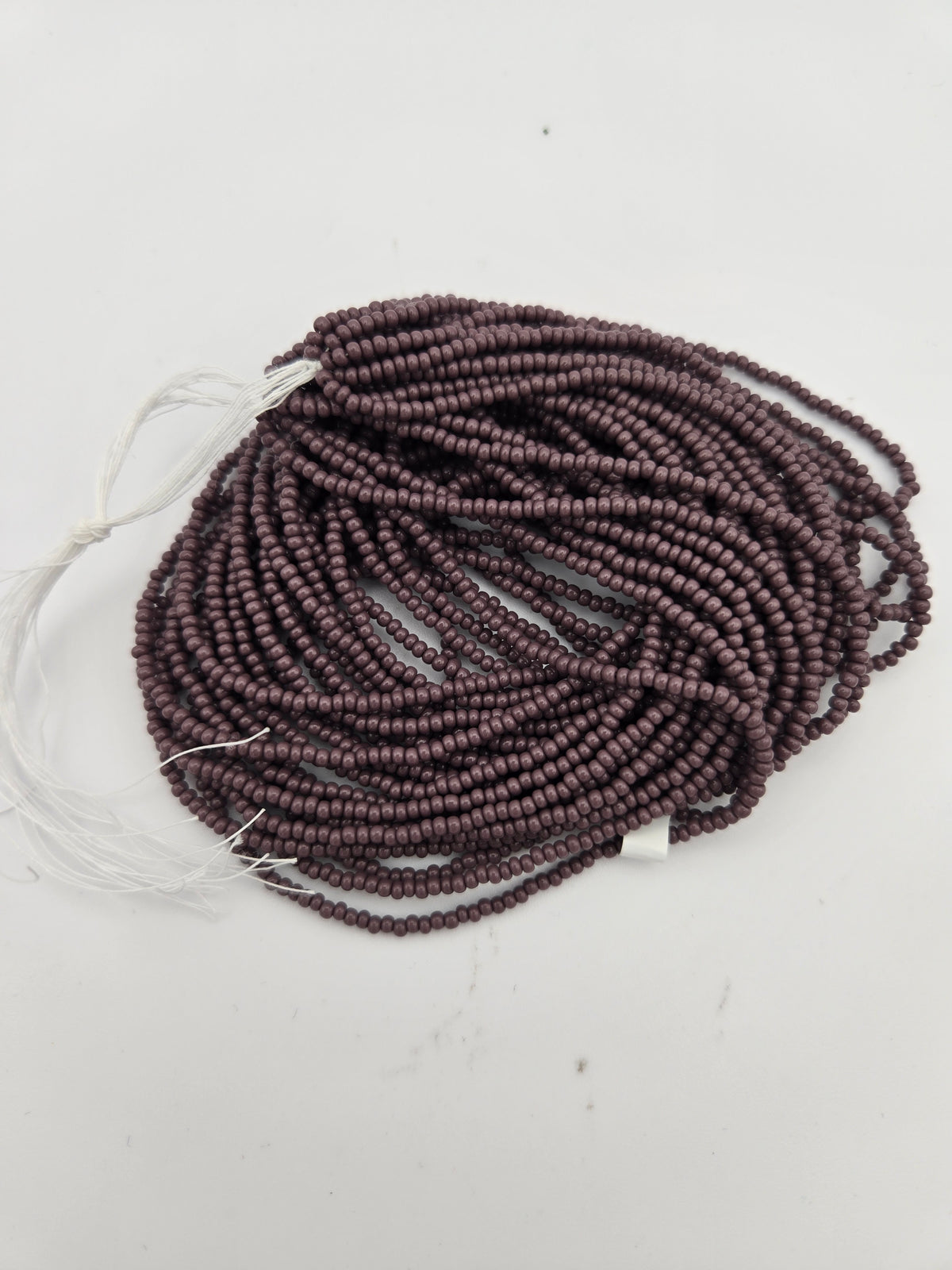 Czech Seed Bead 11/0 Op Dark Mauve Strung