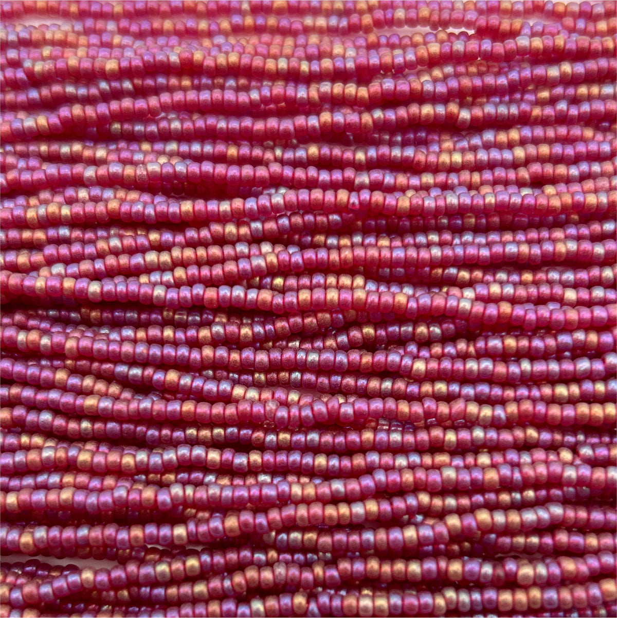 Czech Seed Bead 11/0 Transparent Dark Red Matte AB Strung