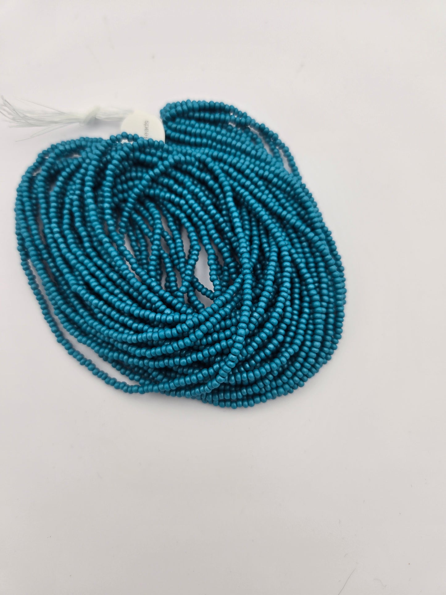 Czech 11/0 PermaLux Dyed Chalk Teal Strung